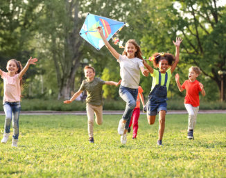 happy kids playing outdoors