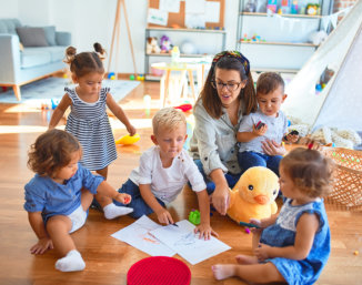 teacher with her students doing an activity